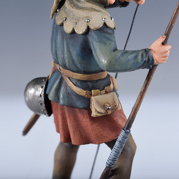Englsh archer frng a longbow at the Battle of Agncourt, 1415